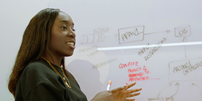 Young woman delivering presentation